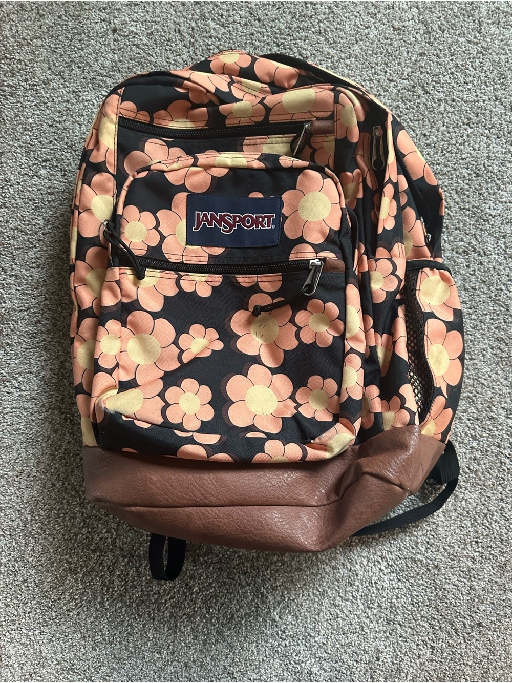 Jansport Black Backpack with Peach & yellow Floral Print